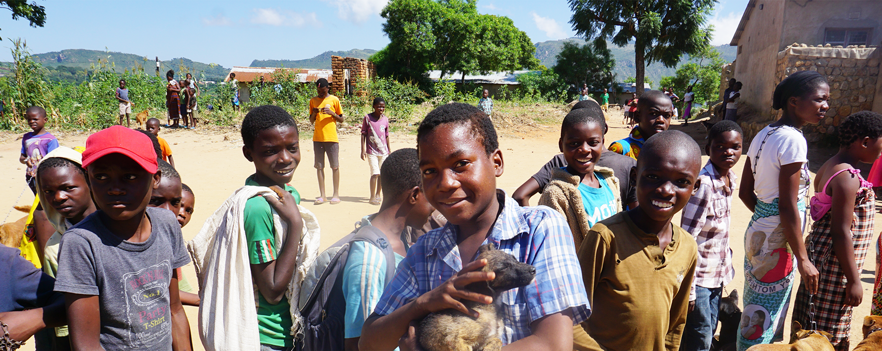 Village children gather for a group photo.