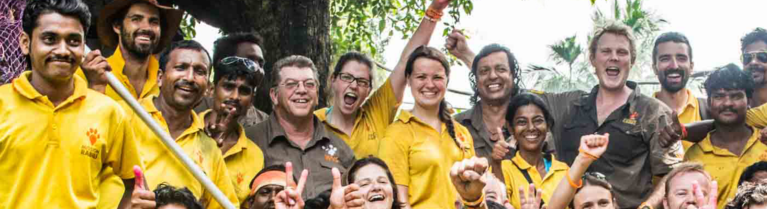 Mission Rabies volunteers pose for a group photograph.